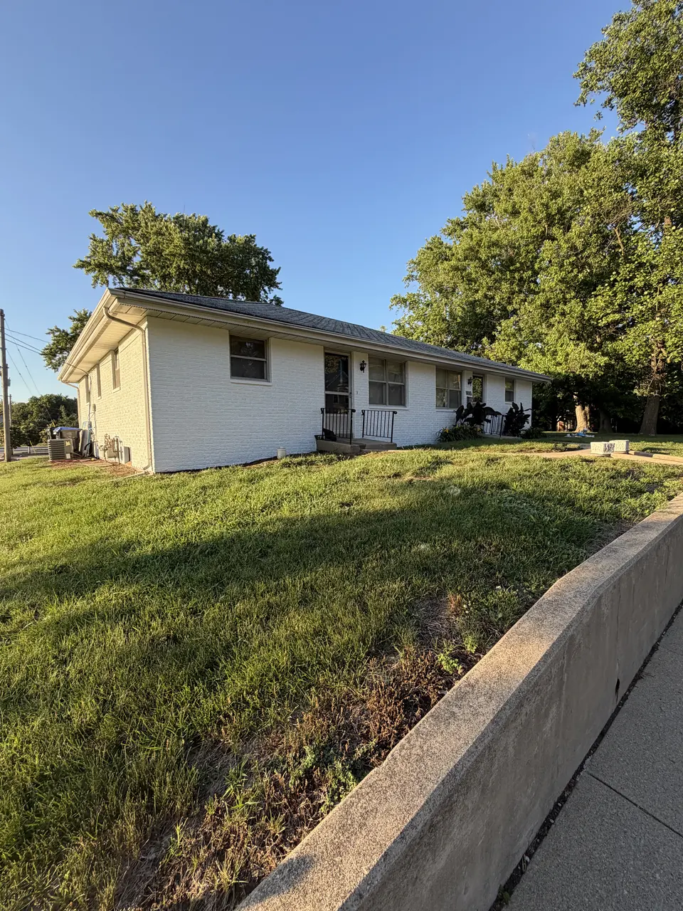 Duplex with freshly painted white brick